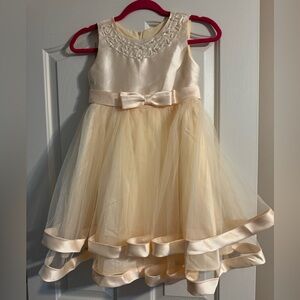 Cream colored fancy dress for girls